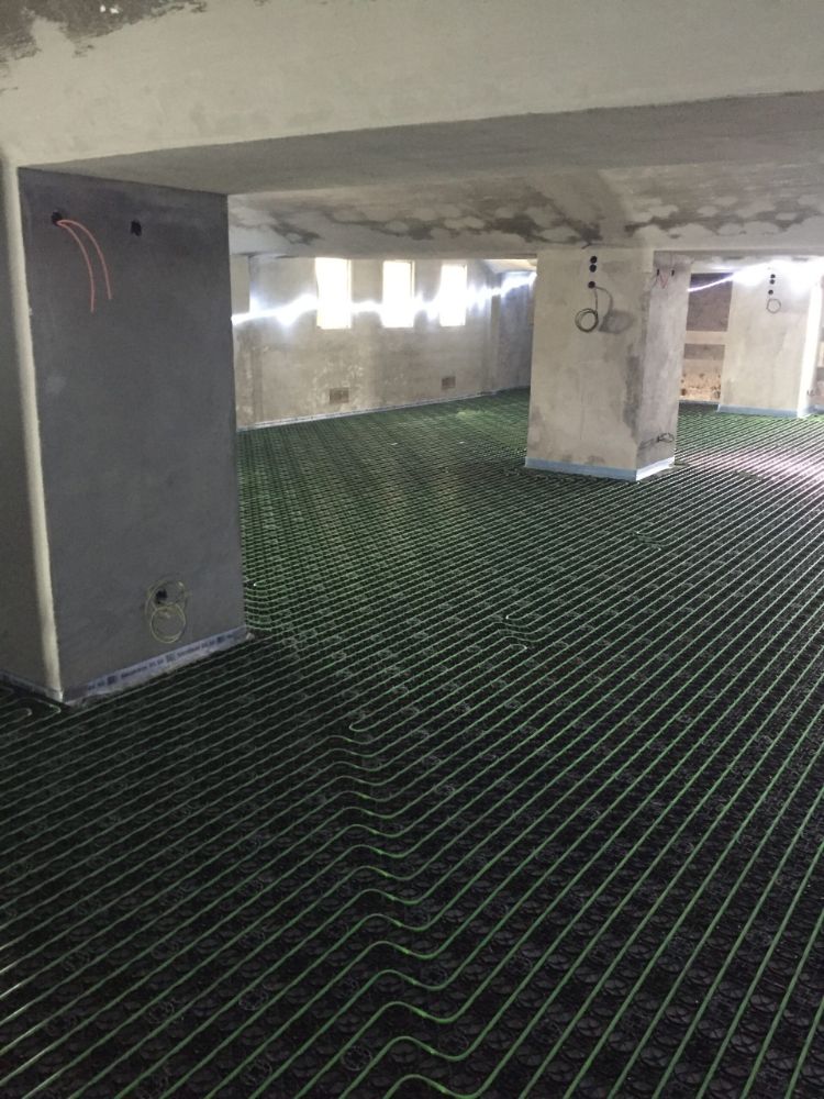 Vloerverwarming in historisch gebouw zonder afwerking