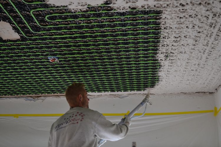 WARP Systems plafondverwarming SpeeTile systeem plafond spuiten