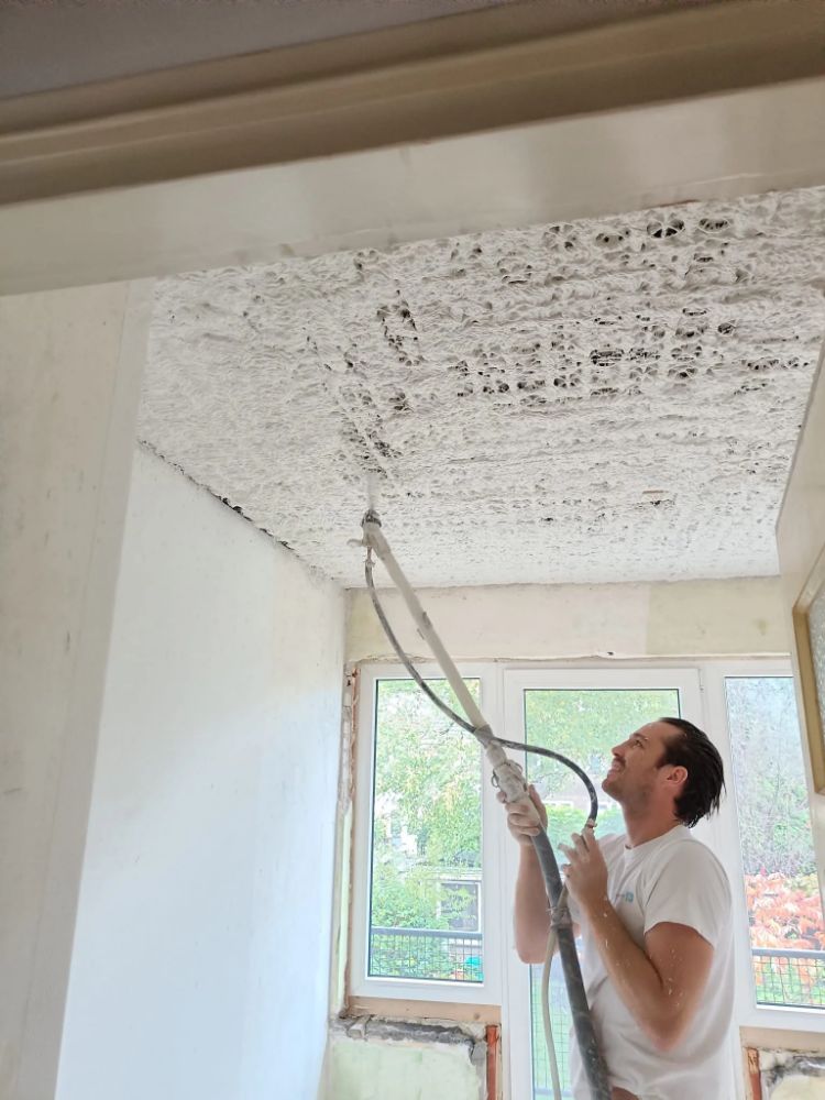 WARP Systems tussenwoning SpeeTile plafondverwarming spuiten