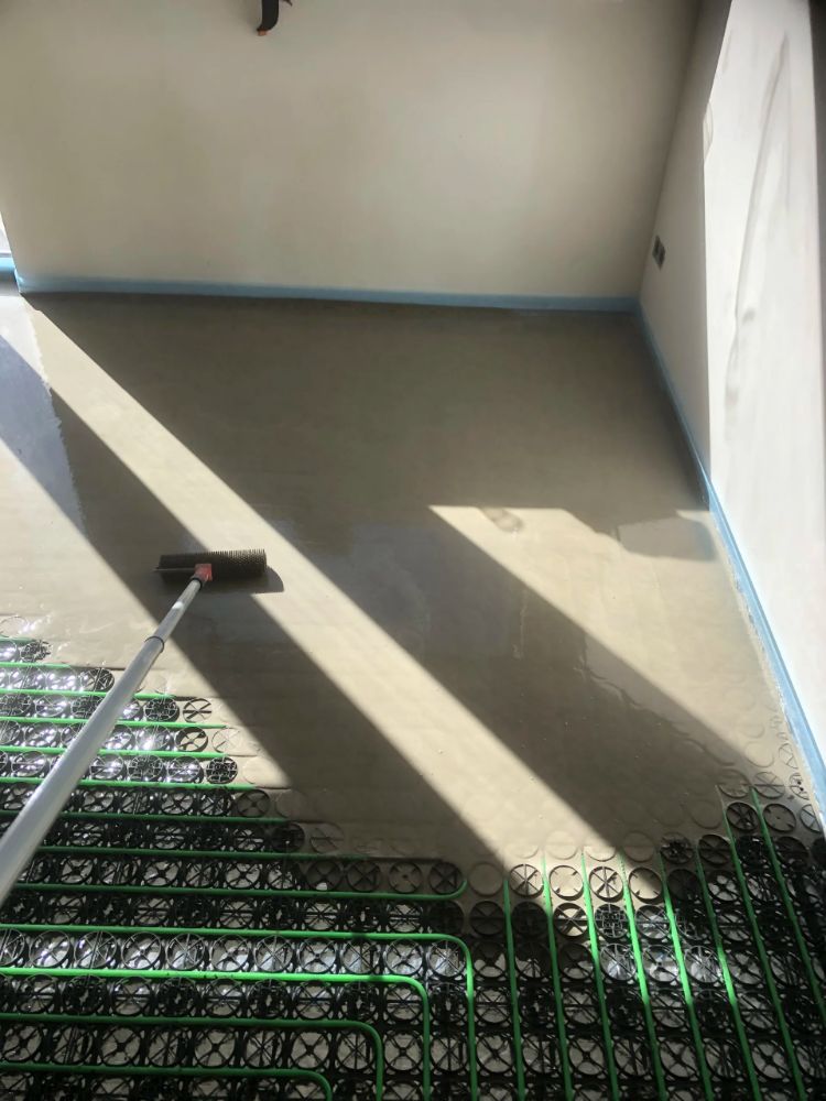 WARP Systems rijtjeswoning SpeeTile Systeem aanbrengen vulmassa