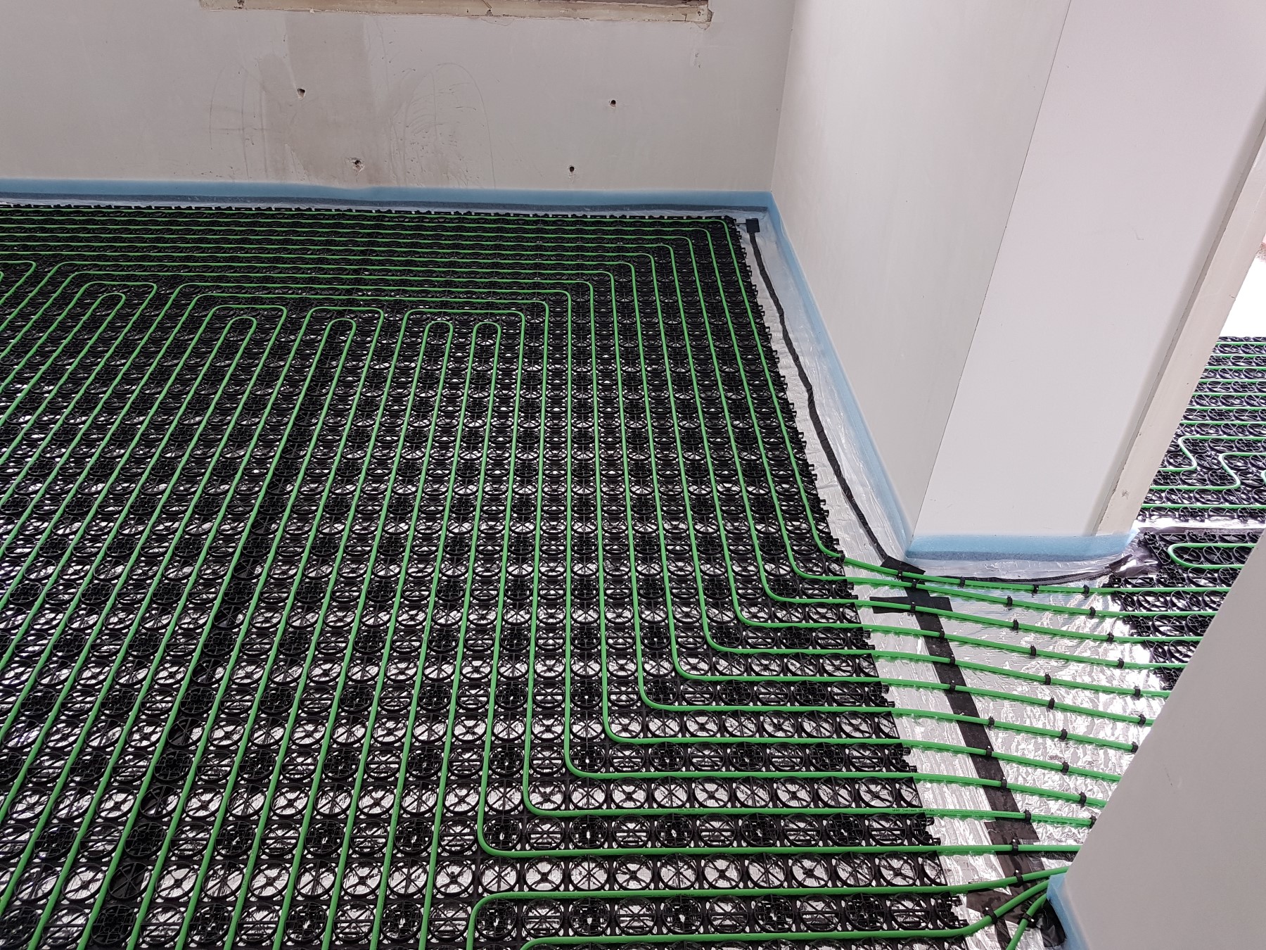 WARP vloerverwarming op houten vloer