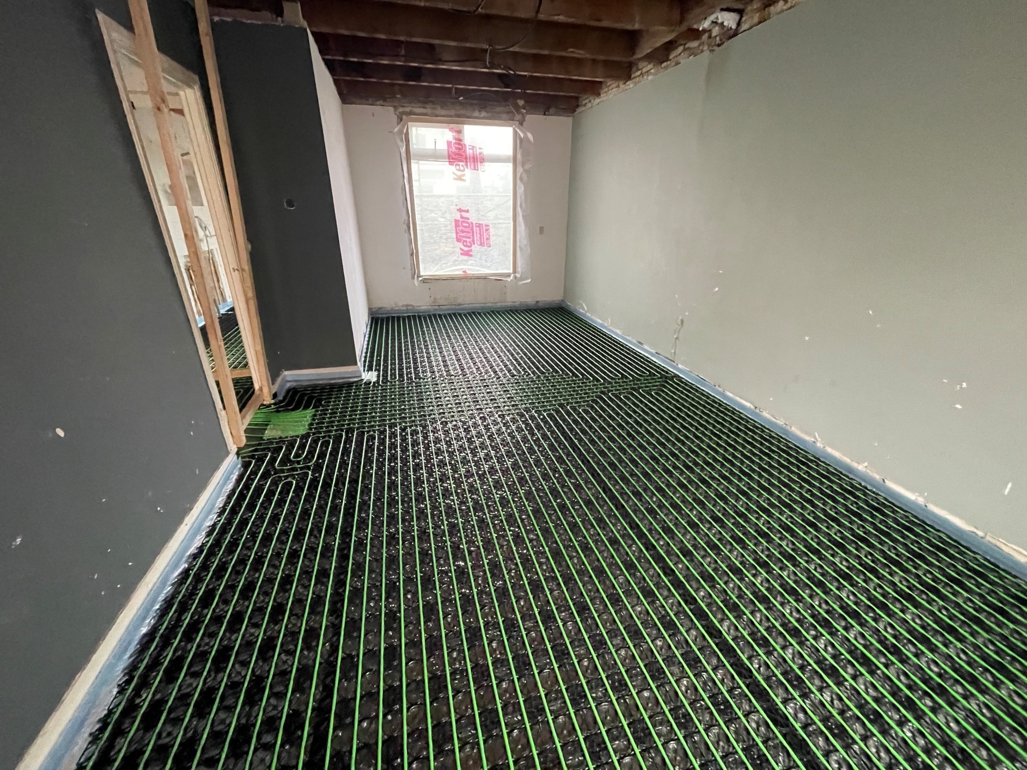 WARP vloerverwarming op houten vloer