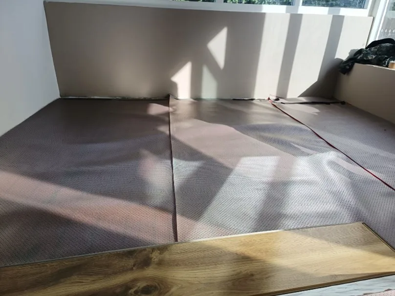 WARP Systems woonkamer hoekwoning heatfoil installatie SpeeTherm