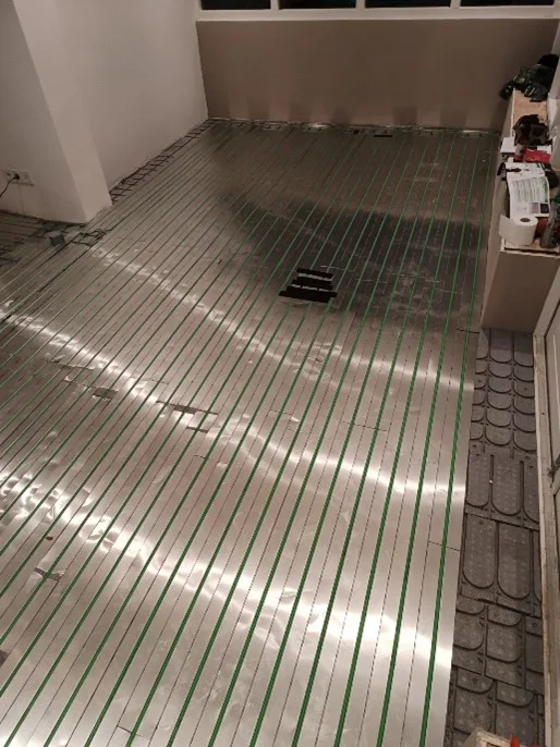 WARP Systems woonkamer hoekwoning tijdens installatie SpeeTherm